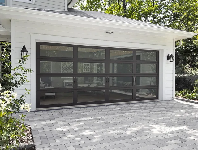 La Puente Garage Door Repair design specialist presenting custom garage door options to La Puente homeowner