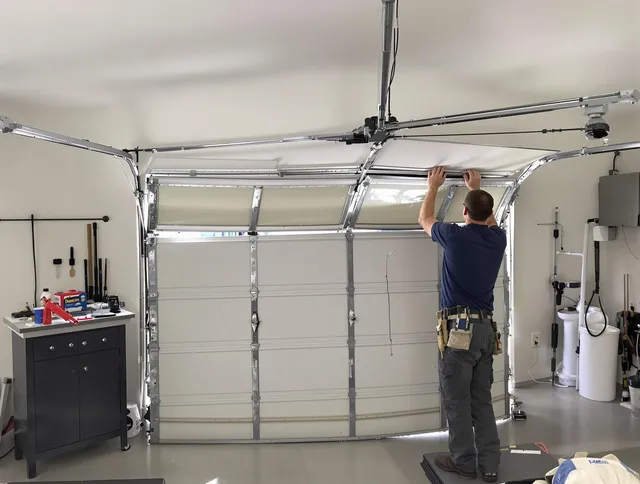 La Puente Garage Door Repair specialist performing precise section replacement on La Puente garage door