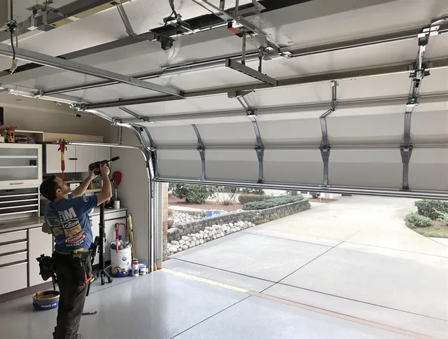 Garage door track repair service by La Puente Garage Door Repair in La Puente
